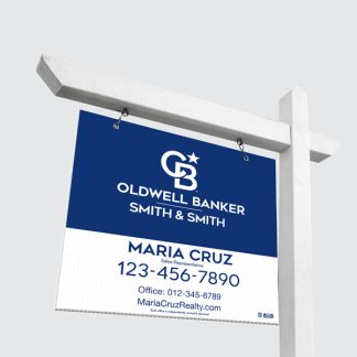 Coldwell Banker For Sale Sign Hanging On Post